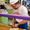 Diller schneeballen baker (1480 visits) The Diller schneeballen baker is making strips of shortcrust pastry Diller schneeballen baker